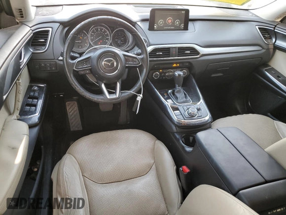 2016 Mazda CX-9 Touring with VIN JM3TCACY7G0110041, listed as a Copart auction lot 59218545 with 142,198 mi miles and Salvage title. Bid and sale history available at DreamBid. Image 8.