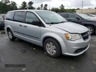 2012 Ram Cargo Van with VIN 2C4RDGAG1CR385997, listed as a Copart auction lot 67888854 with 329,287 mi miles and Salvage Title. Bid and sale history available at carsss.com. Image 4.
