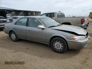 1998 Toyota Camry LE z VIN JT2BG28K7W0215608, wystawiony jako Copart lot #49919085 z przebiegiem 182 353 mil mil oraz Czysty tytuł • Clean title. Historia ofert i sprzedaży dostępna na DreamBid. Obrazek 4.