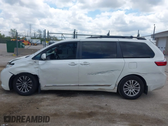 2016 Toyota Sienna XLE with VIN 5TDYK3DC4GS702638, listed as a IAAI auction lot 42255793 with 124,977 mi miles and . Bid and sale history available at DreamBid. Image 14.