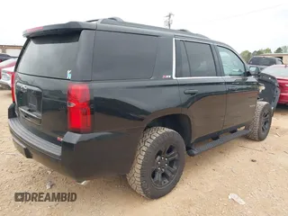 2017 Chevrolet Tahoe LT with VIN 1GNSKBKCXHR388181, listed as a IAAI auction lot 41936609 with 94,783 mi miles and . Bid and sale history available at DreamBid. Image 4.