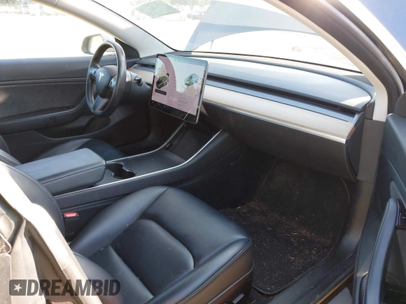 2018 Tesla Model 3 Long Range Battery with VIN 5YJ3E1EA1JF021139, listed as a IAAI auction lot 42116626 with 83,003 mi miles and . Bid and sale history available at DreamBid. Image 5.