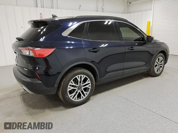 2021 Ford Escape SEL z VIN 1FMCU9H6XMUA64636, wystawiony jako Copart lot #62016695 z przebiegiem 98 479 mil mil oraz Czysty tytuł • Clean title. Historia ofert i sprzedaży dostępna na DreamBid. Obrazek 3.