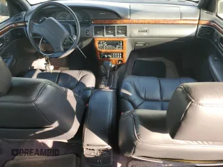 1996 Chrysler LHS z VIN 2C3HC56F8TH233048, wystawiony jako Copart lot #66957634 z przebiegiem 97 626 mil mil oraz Tytuł czysty. Historia ofert i sprzedaży dostępna na DreamBid. Obrazek 8.