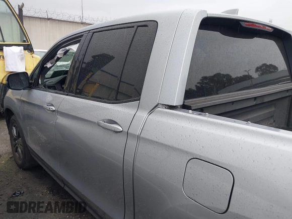 2018 Honda Ridgeline Sport with VIN 5FPYK2F19JB000713, listed as a IAAI auction lot 41300244 with 52,119 mi miles and . Bid and sale history available at DreamBid. Image 14.