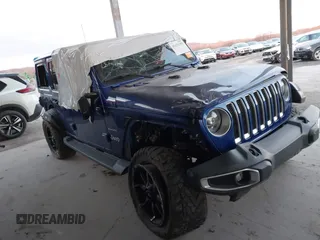2018 Jeep Wrangler Unlimited Sahara z VIN 1C4HJXEN0JW274942, wystawiony jako IAAI lot #41175231 z przebiegiem 97 255 mil mil oraz . Historia ofert i sprzedaży dostępna na DreamBid. Obrazek 1.