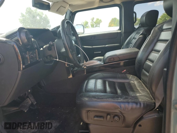 2007 Hummer H2 SUV z VIN 5GRGN23UX7H101776, wystawiony jako Copart lot #56337975 z przebiegiem 176 599 mil mil oraz Szkoda całkowita • Salvage title. Historia ofert i sprzedaży dostępna na DreamBid. Obrazek 7.