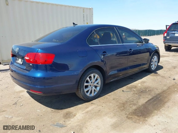 2014 Volkswagen Jetta Sedan SE with VIN 3VWD07AJ1EM441493, listed as a IAAI auction lot 41969564 with 110,632 mi miles. Bid and sale history available at carsss.com. Image 4.