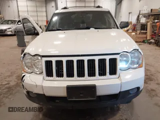 2010 Jeep Grand Cherokee Laredo with VIN 1J4PR4GK7AC126059, listed as a IAAI auction lot 41599058 with 154,192 mi miles. Bid and sale history available at carsss.com. Image 13.