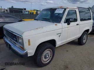 1986 Ford Bronco z VIN 1FMCU14T0GUC51692, wystawiony jako IAAI lot #41982392 z przebiegiem 509 734 mil mil oraz . Historia ofert i sprzedaży dostępna na DreamBid. Obrazek 2.