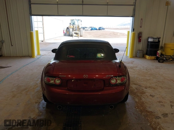 2007 Mazda MX-5 Miata Sport z VIN JM1NC25F970132299, wystawiony jako IAAI lot #41622791 z przebiegiem 72 392 mil mil oraz . Historia ofert i sprzedaży dostępna na DreamBid. Obrazek 17.