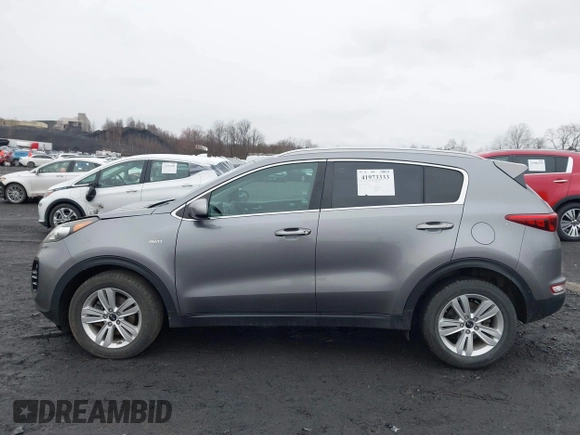 2017 Kia Sportage LX with VIN KNDPMCAC2H7238741, listed as a IAAI auction lot 41973333 with 64,714 mi miles and . Bid and sale history available at carsss.com. Image 14.