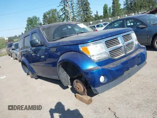 2010 Dodge Nitro SE with VIN 1D4PT2GK4AW141616, listed as a IAAI auction lot 42183953 with 128,023 mi miles. Bid and sale history available at carsss.com. Image 1.