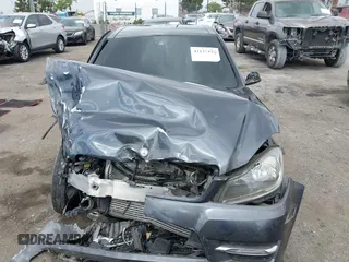 2014 Mercedes-Benz C C 250 Sport with VIN WDDGF4HB6ER317333, listed as a IAAI auction lot 42127437 with 128,010 mi miles. Bid and sale history available at carsss.com. Image 13.