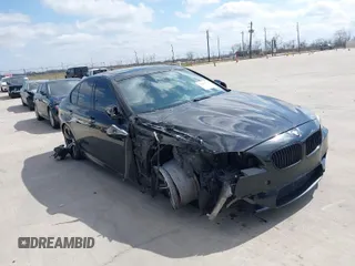 2013 BMW M5 with VIN WBSFV9C54DD095547, listed as a IAAI auction lot 41601733 with 1 mi miles. Bid and sale history available at carsss.com. Image 1.