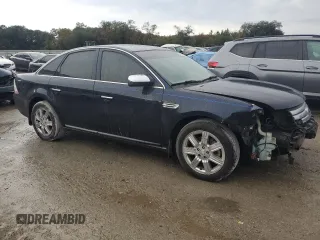 2009 Ford Taurus Limited with VIN 1FAHP25W69G117096, listed as a Copart auction lot 84262534 with 195,159 mi miles and Salvage Title. Bid and sale history available at carsss.com. Image 4.