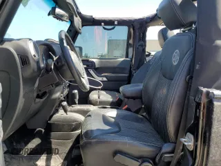 2015 Jeep Wrangler Sport with VIN 1C4GJWAG8FL563198, listed as a Copart auction lot 52867385 with 47,854 mi miles and Salvage title. Bid and sale history available at DreamBid. Image 7.