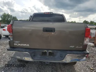 2013 Toyota Tundra с VIN 5TFDW5F11DX295149, выставлен на аукционе Copart как лот 58705855 с пробегом 285 533 миль миль и Списание • Salvage title. История ставок и продаж доступна на DreamBid. Изображение 6.