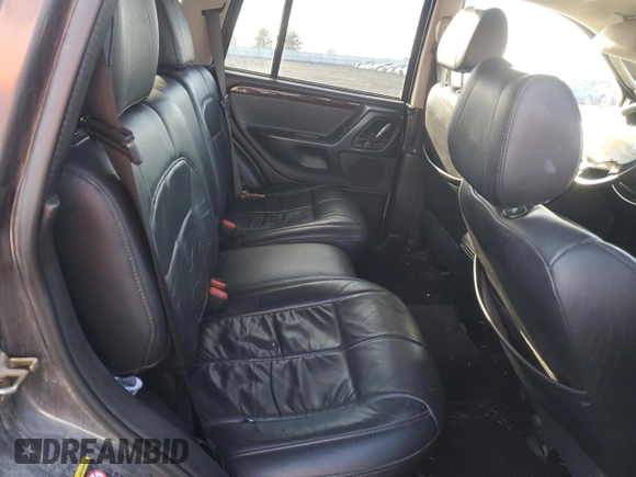 2003 Jeep Grand Cherokee Limited z VIN 1J8GW58N73C502929, wystawiony jako Copart lot #79472734 z przebiegiem 231 176 mil mil oraz Szkoda całkowita • Salvage title. Historia ofert i sprzedaży dostępna na DreamBid. Obrazek 11.