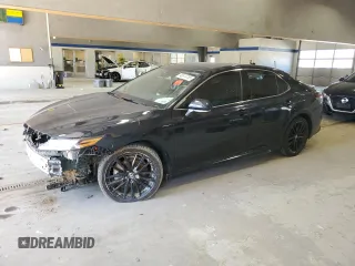 2021 Toyota Camry XSE with VIN 4T1KZ1AK1MU051943, listed as a Copart auction lot 49514785 with 124,306 mi miles and Salvage title. Bid and sale history available at DreamBid. Image 1.