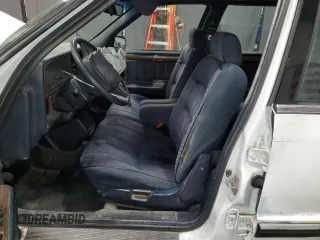 1992 Dodge Dynasty LE z VIN 1B3XC56RXND822802, wystawiony jako Copart lot #82799714 z przebiegiem 137 131 mil mil oraz Szkoda całkowita • Salvage title. Historia ofert i sprzedaży dostępna na DreamBid. Obrazek 7.