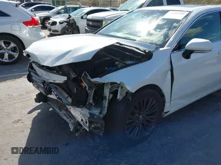 2019 Toyota Avalon XLE z VIN 4T1BZ1FB2KU014289, wystawiony jako IAAI lot #41905789 z przebiegiem 121 906 mil mil oraz . Historia ofert i sprzedaży dostępna na DreamBid. Obrazek 19.