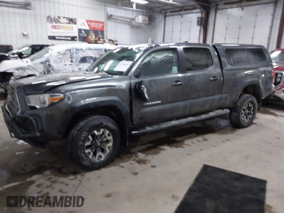 2016 Toyota Tacoma SR5 with VIN 3TMDZ5BNXGM009423, listed as a IAAI auction lot 41008068 with 107,426 mi miles and . Bid and sale history available at DreamBid. Image 17.