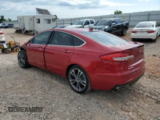 2020 Ford Fusion Titanium with VIN 3FA6P0K91LR180973, listed as a Copart auction lot 60023215 with 26,615 mi miles and Salvage title. Bid and sale history available at DreamBid. Image 2.