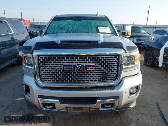 2017 GMC Sierra 2500HD Denali with VIN 1GT12UEY2HF192132, listed as a IAAI auction lot 42094570 with 119,361 mi miles and . Bid and sale history available at DreamBid. Image 13.