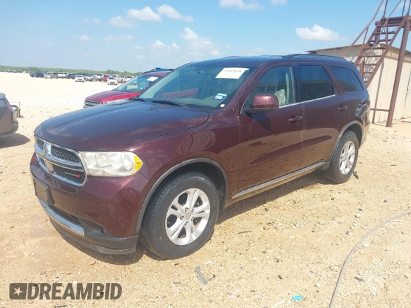 2012 Dodge Durango SXT with VIN 1C4RDHAG8CC361176, listed as a IAAI auction lot 42643631 with 201,419 mi miles and . Bid and sale history available at DreamBid. Image 2.