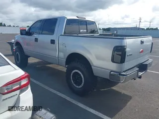 2007 Ford F-150 XLT with VIN 1FTPW12V77FB78121, listed as a IAAI auction lot 42300080 with 203,990 mi miles and . Bid and sale history available at DreamBid. Image 3.