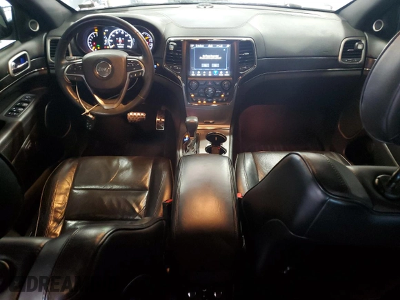 2018 Jeep Grand Cherokee Overland with VIN 1C4RJFCG5JC211145, listed as a Copart auction lot 54138865 with 115,679 mi miles and Salvage title. Bid and sale history available at DreamBid. Image 8.
