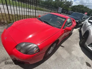 1999 Mitsubishi 3000GT GT z VIN JA3AM84J3XY001387, wystawiony jako Copart lot #61198735 z przebiegiem 137 514 mil mil oraz Czysty tytuł • Clean title. Historia ofert i sprzedaży dostępna na DreamBid. Obrazek 2.