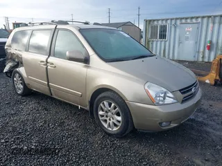 2007 Kia Sedona EX with VIN KNDMB233676121720, listed as a IAAI auction lot 41606082 with 200,736 mi miles. Bid and sale history available at carsss.com. Image 1.