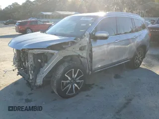 2019 Honda Pilot Touring 7-Passenger z VIN 5FNYF5H6XKB007713, wystawiony jako Copart lot #84435934 z przebiegiem Nie podano mil oraz Szkoda całkowita • Salvage title. Historia ofert i sprzedaży dostępna na DreamBid. Obrazek 1.