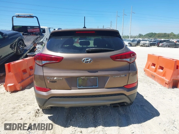 2016 Hyundai Tucson Sport with VIN KM8J33A29GU054909, listed as a IAAI auction lot 41835688 with 90,751 mi miles. Bid and sale history available at carsss.com. Image 16.