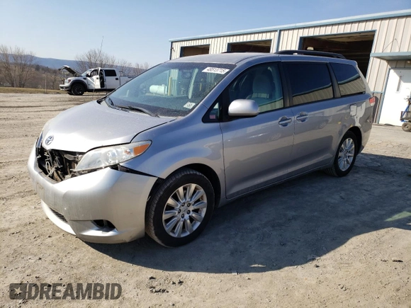 2012 Toyota Sienna LE with VIN 5TDJK3DC1CS031232, listed as a Copart auction lot 48513715 with 214,353 mi miles and Salvage Title. Bid and sale history available at carsss.com. Image 1.