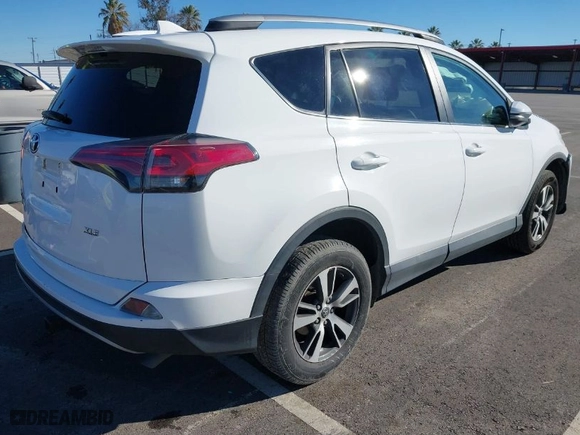 2018 Toyota RAV4 XLE with VIN 2T3WFREV8JW425027, listed as a IAAI auction lot 41272635 with 79,445 mi miles. Bid and sale history available at carsss.com. Image 4.