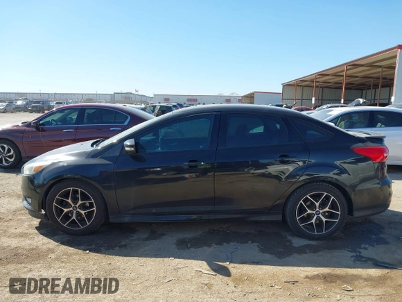 2015 Ford Focus SE with VIN 1FADP3F24FL313640, listed as a IAAI auction lot 41651845 with 146,390 mi miles. Bid and sale history available at carsss.com. Image 15.