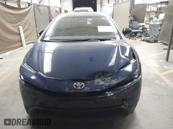 2024 Toyota Prius LE with VIN JTDACAAU0R3030582, listed as a IAAI auction lot 41838615 with 9,402 mi miles and . Bid and sale history available at DreamBid. Image 12.