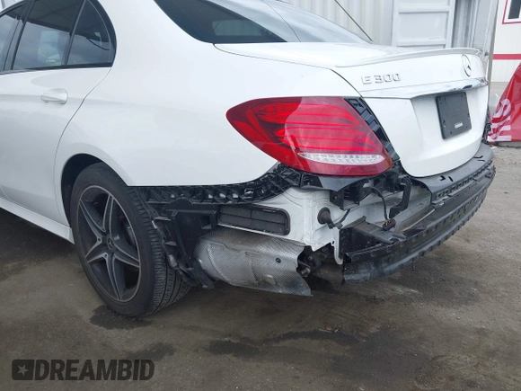 2018 Mercedes-Benz E 300 with VIN WDDZF4JB0JA371240, listed as a IAAI auction lot 42061937 with 66,167 mi miles and . Bid and sale history available at DreamBid. Image 21.
