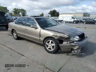 1998 Toyota Avalon XL with VIN 4T1BF18B1WU255028, listed as a Copart auction lot 51017075 with 248,911 mi miles and Salvage Title. Bid and sale history available at DreamBid. Image 4.