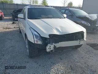 2014 Cadillac ATS Standard AWD with VIN 1G6AG5RX8E0152177, listed as a IAAI auction lot 42095293 with 143,485 mi miles and . Bid and sale history available at carsss.com. Image 6.