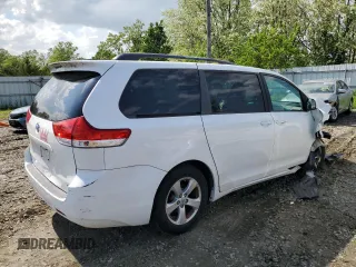 2014 Toyota Sienna LE AAS with VIN 5TDKK3DC6ES497746, listed as a Copart auction lot 56125845 with 142,596 mi miles and Salvage Title. Bid and sale history available at DreamBid. Image 3.