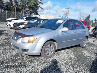 2007 Kia Spectra EX with VIN KNAFE121375453966, listed as a IAAI auction lot 41775758 with 211,586 mi miles. Bid and sale history available at carsss.com. Image 18.