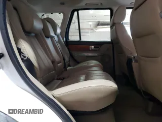 2011 Land Rover Range Rover Sport SC z VIN SALSH2E49BA268320, wystawiony jako Copart lot #55938715 z przebiegiem 134 666 mil mil oraz Szkody całkowita. Historia ofert i sprzedaży dostępna na DreamBid. Obrazek 11.