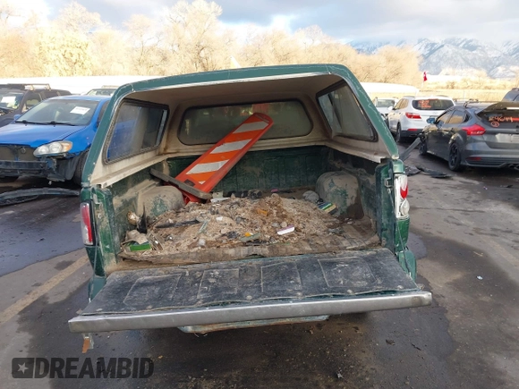 1997 GMC Sonoma SLS with VIN 1GTDT19X0V8502966, listed as a IAAI auction lot 41331331 with 308,584 mi miles. Bid and sale history available at carsss.com. Image 15.