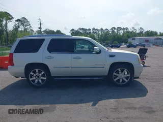 2009 Cadillac Escalade z VIN 1GYFK23249R284846, wystawiony jako IAAI lot #42184659 z przebiegiem Nie podano mil oraz . Historia ofert i sprzedaży dostępna na DreamBid. Obrazek 13.