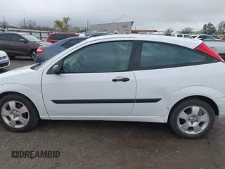 2004 Ford Focus ZX3 with VIN 3FAFP31Z94R120332, listed as a IAAI auction lot 40772071 with 218,128 mi miles and . Bid and sale history available at DreamBid. Image 15.