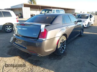 2018 Chrysler 300 with VIN 2C3CCABG5JH214228, listed as a IAAI auction lot 41647033 with 133,224 mi miles. Bid and sale history available at carsss.com. Image 4.